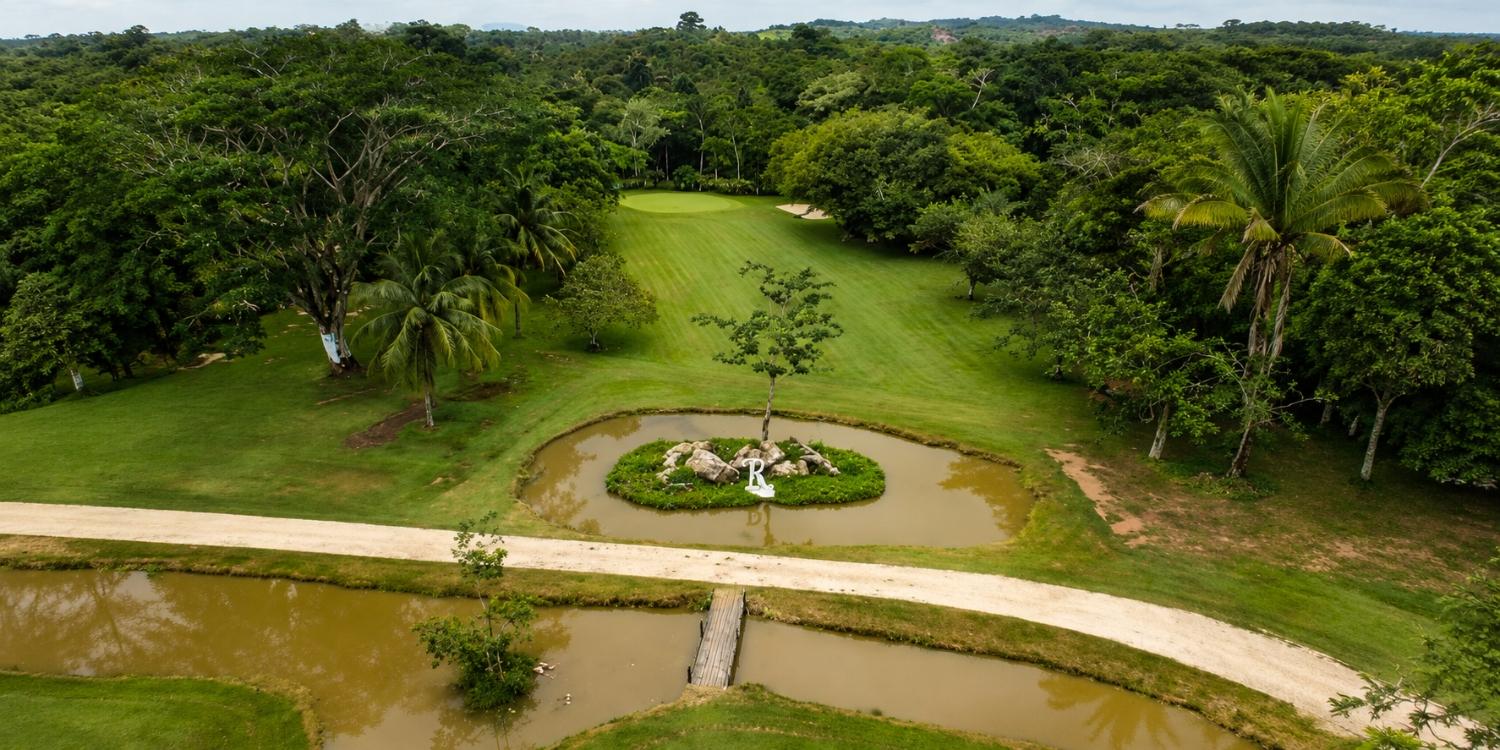 Roaring River Golf Club offers a one-of-a-kind golf experience surrounded by the lush tropical beauty of Belize's Cayo District.